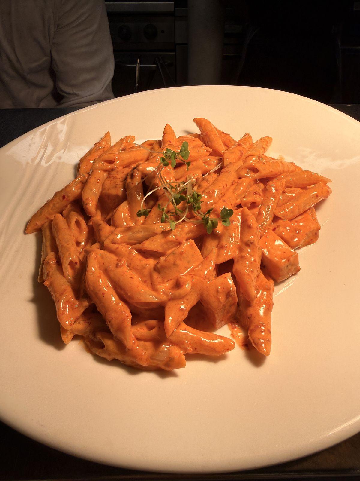 Spicy penne in a creamy chicken and 'nduja sauce