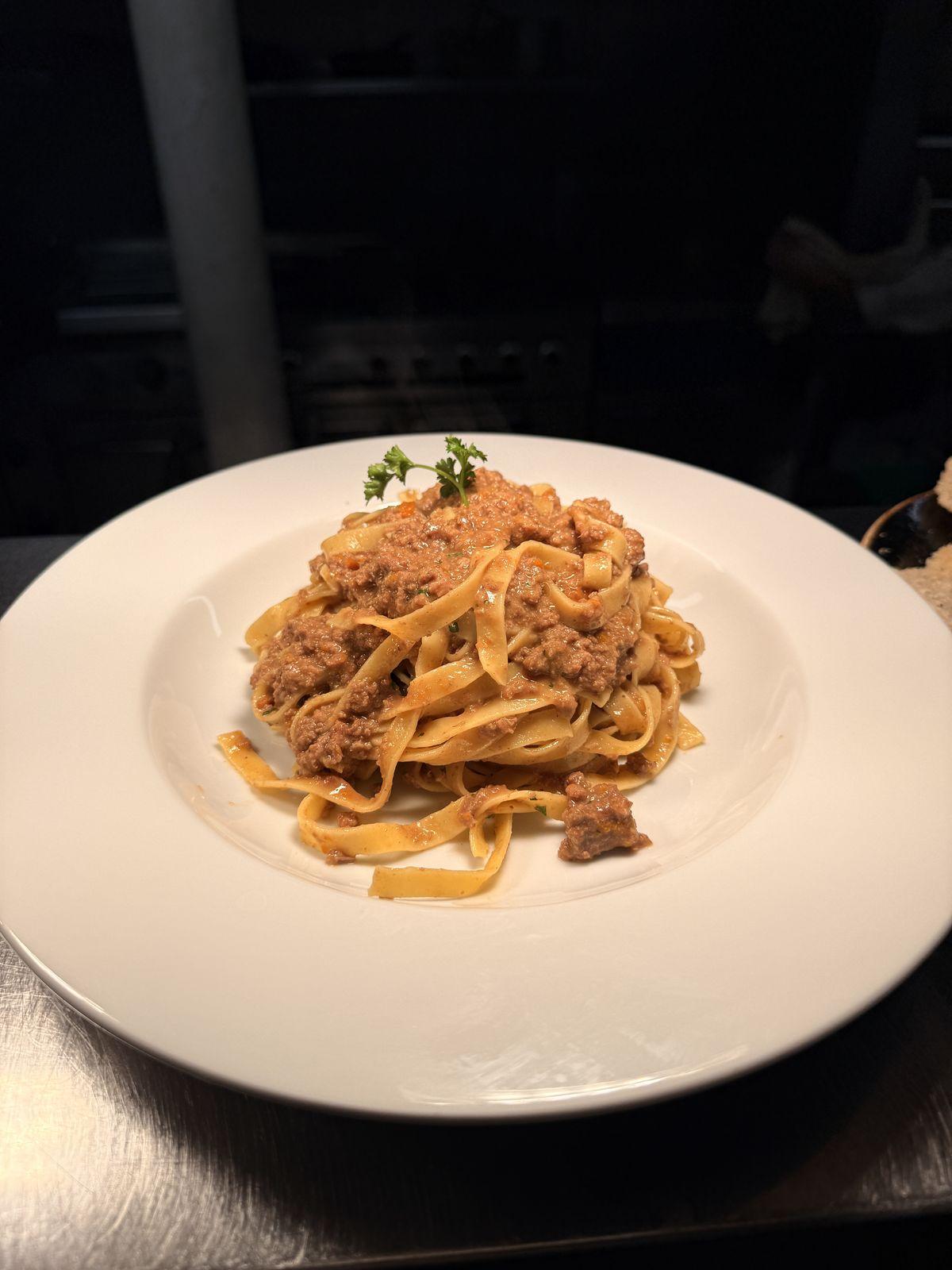 Fresh tagliatelle with slow-cooked ragù