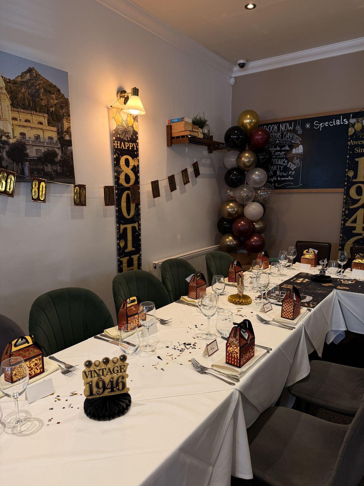 Balloons and party favours for an 80th birthday
